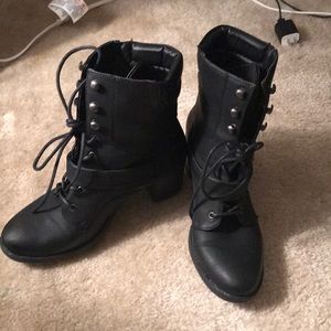Black combat boots with heel
